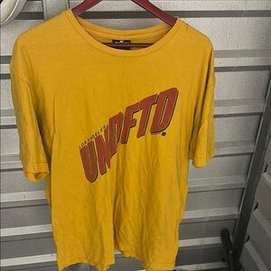 Undefeated Yellow T-Shirt with Red Logo